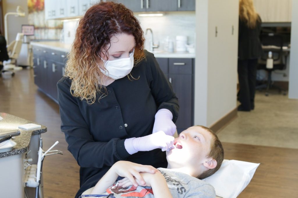 Dillehay Orthodontics assistant with patient