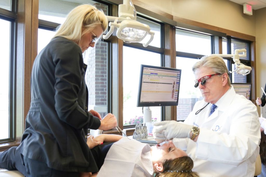 Dr. Dillehay working on a patient's teeth
